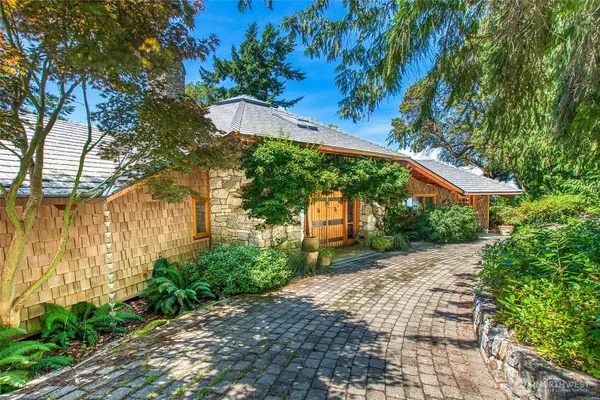 a view of swimming pool with outdoor seating