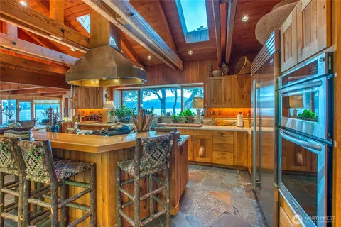 a view of a kitchen with sitting area