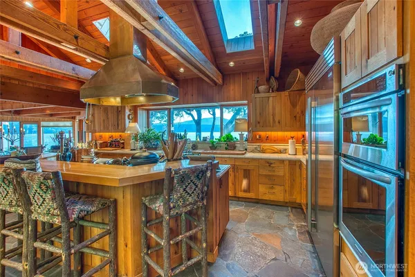 a view of a kitchen with sitting area