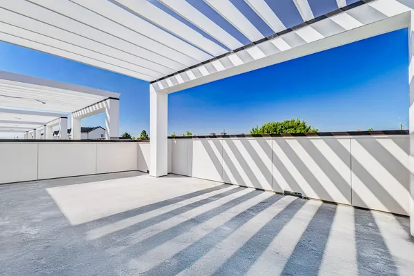 a view of a room with a bed and cabinet
