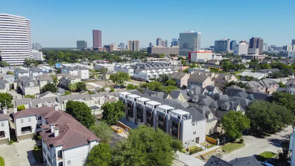 a view of a city with tall buildings