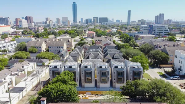 a view of a city with tall buildings