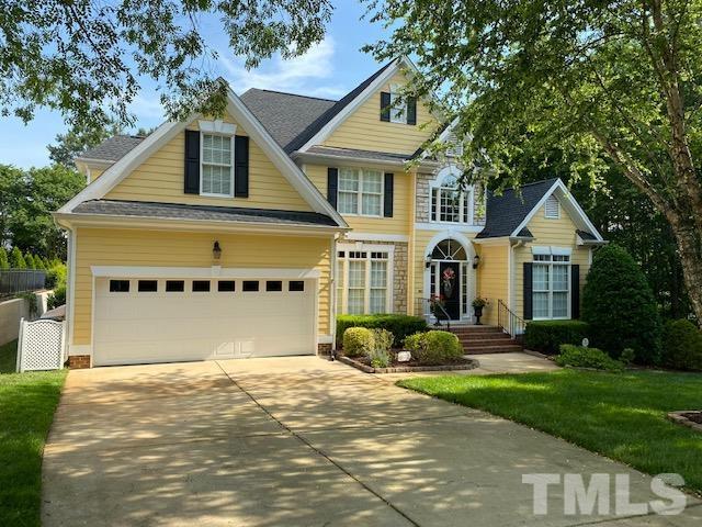 204 Challenge Road Raleigh, NC 27603 - Photo 2 of 42 a front view of a house with garden
