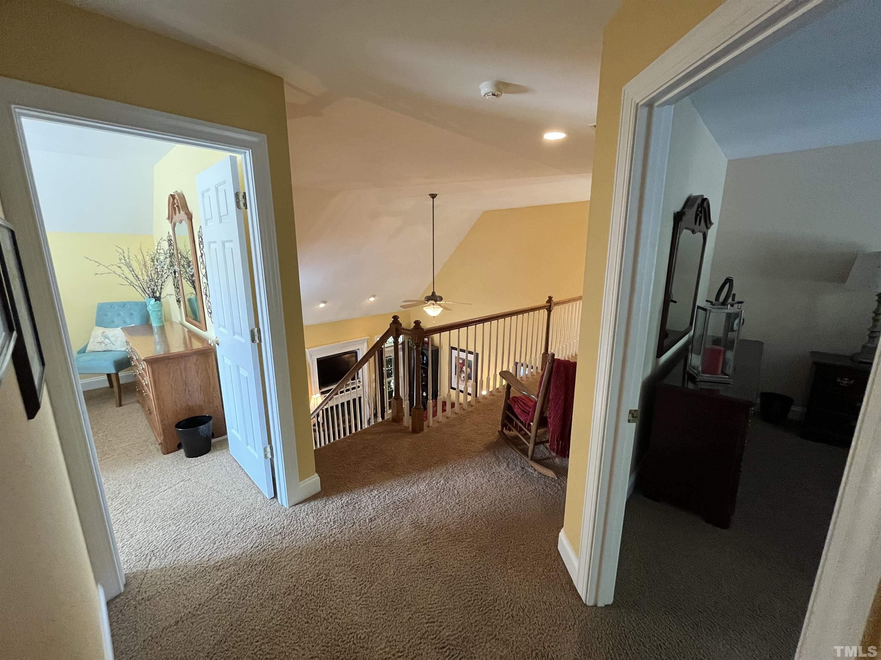 204 Challenge Road Raleigh, NC 27603 - Photo 27 of 42 a view of a hallway with furniture and closet