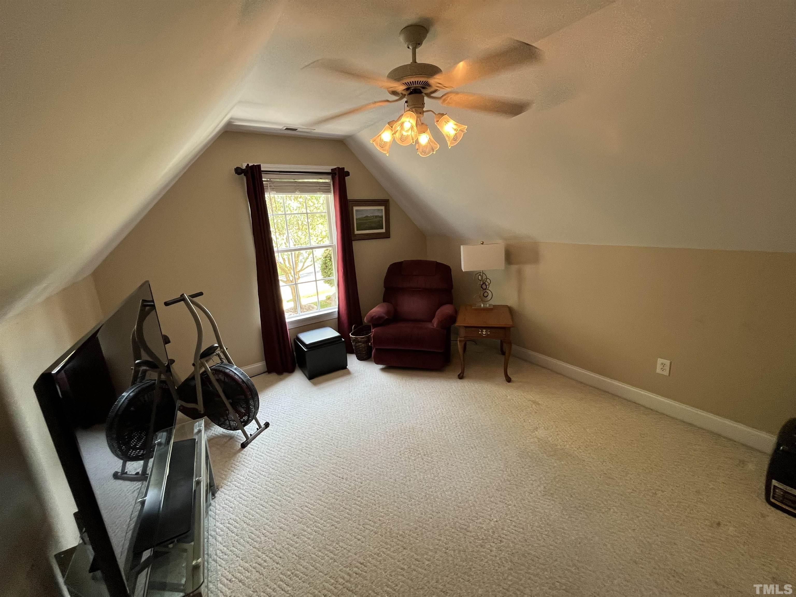 204 Challenge Road Raleigh, NC 27603 - Photo 30 of 42 a view of a livingroom with furniture and a workspace