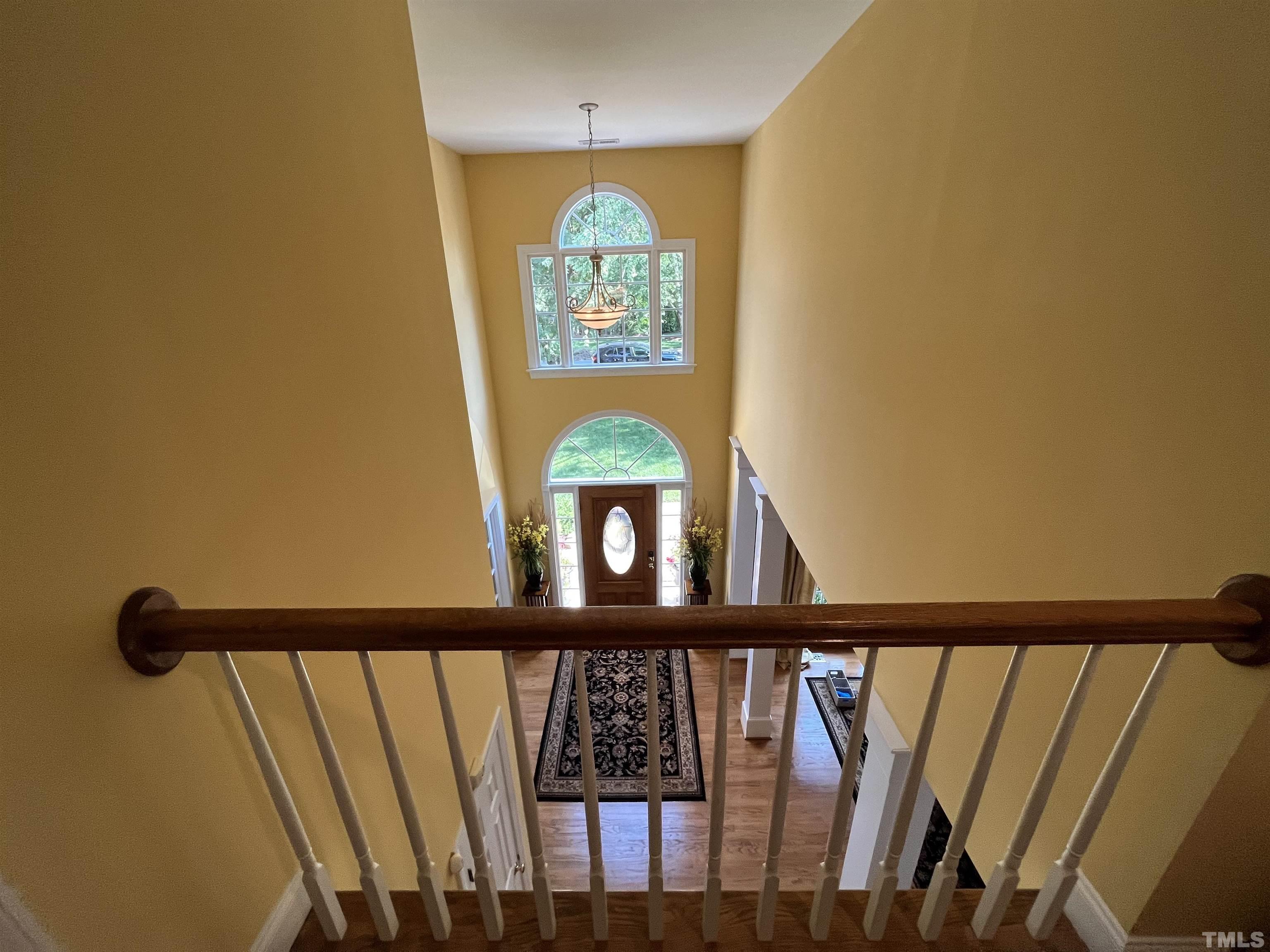 204 Challenge Road Raleigh, NC 27603 - Photo 6 of 42 a view of entryway with wooden floor