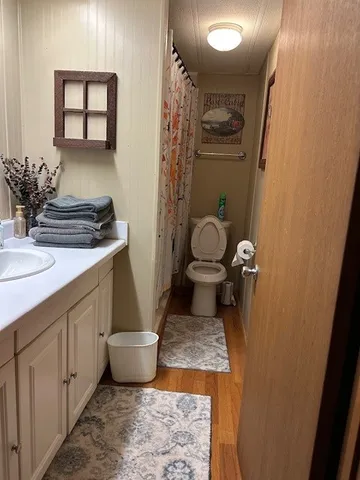 a living room with a couch and a chandelier