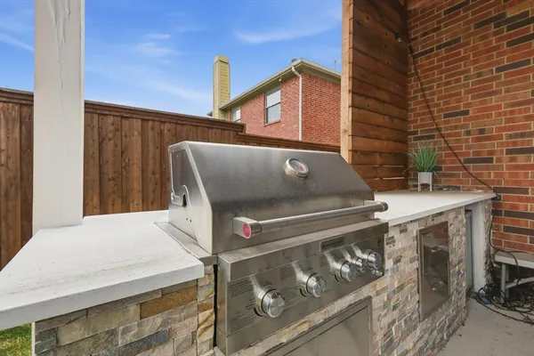 a view of a fireplace with furniture