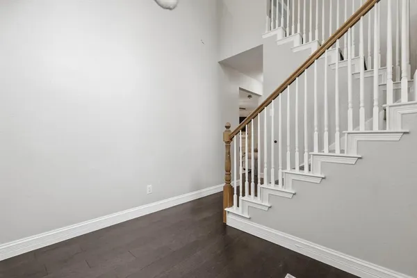 a view of entryway with wooden floor