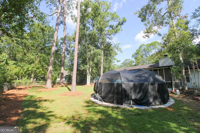 a view of outdoor space and yard