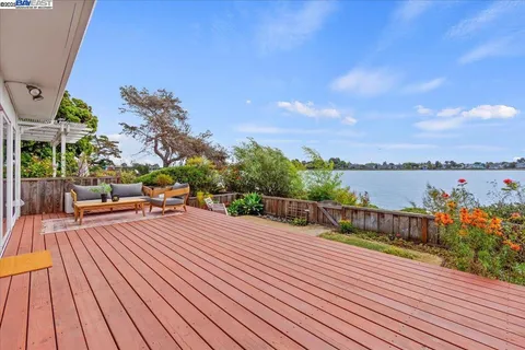 a view of a terrace with wooden floor