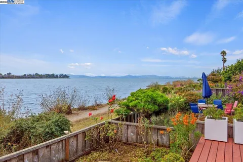 a view of a terrace with lake view