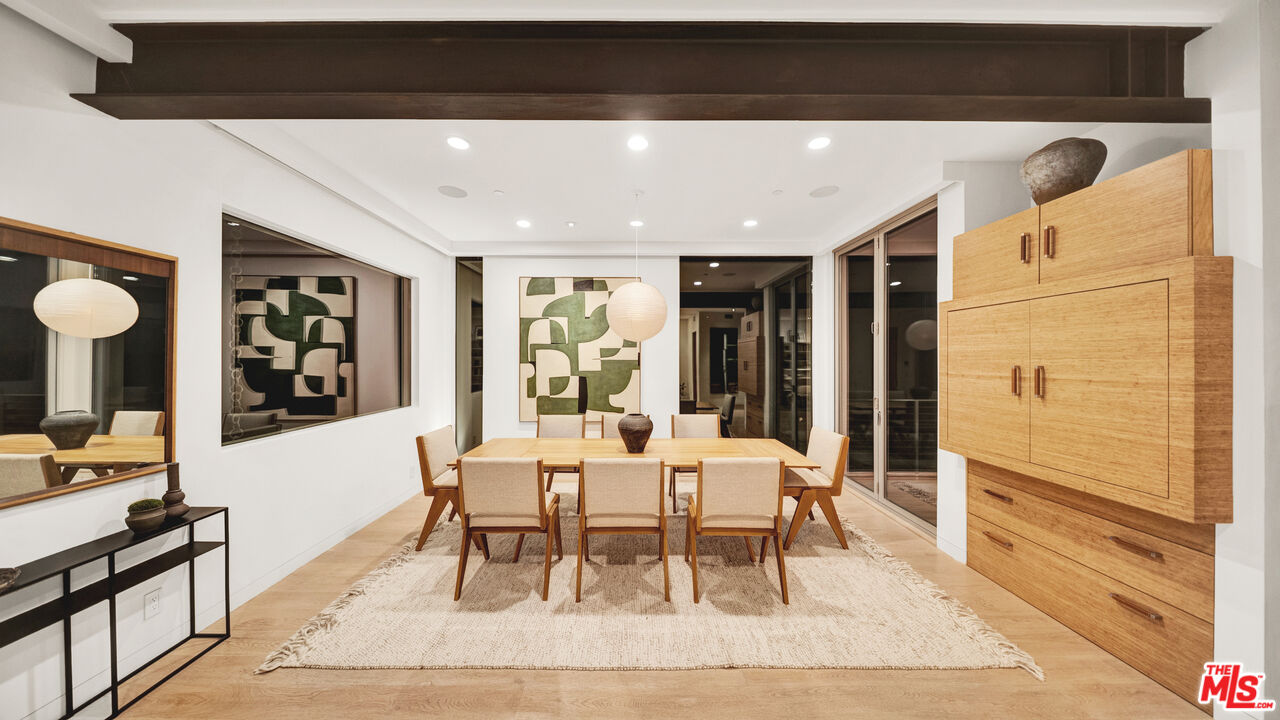 2915 Tuna Canyon Road Topanga, CA 90290 - Photo 10 of 45 a dining room with furniture and window