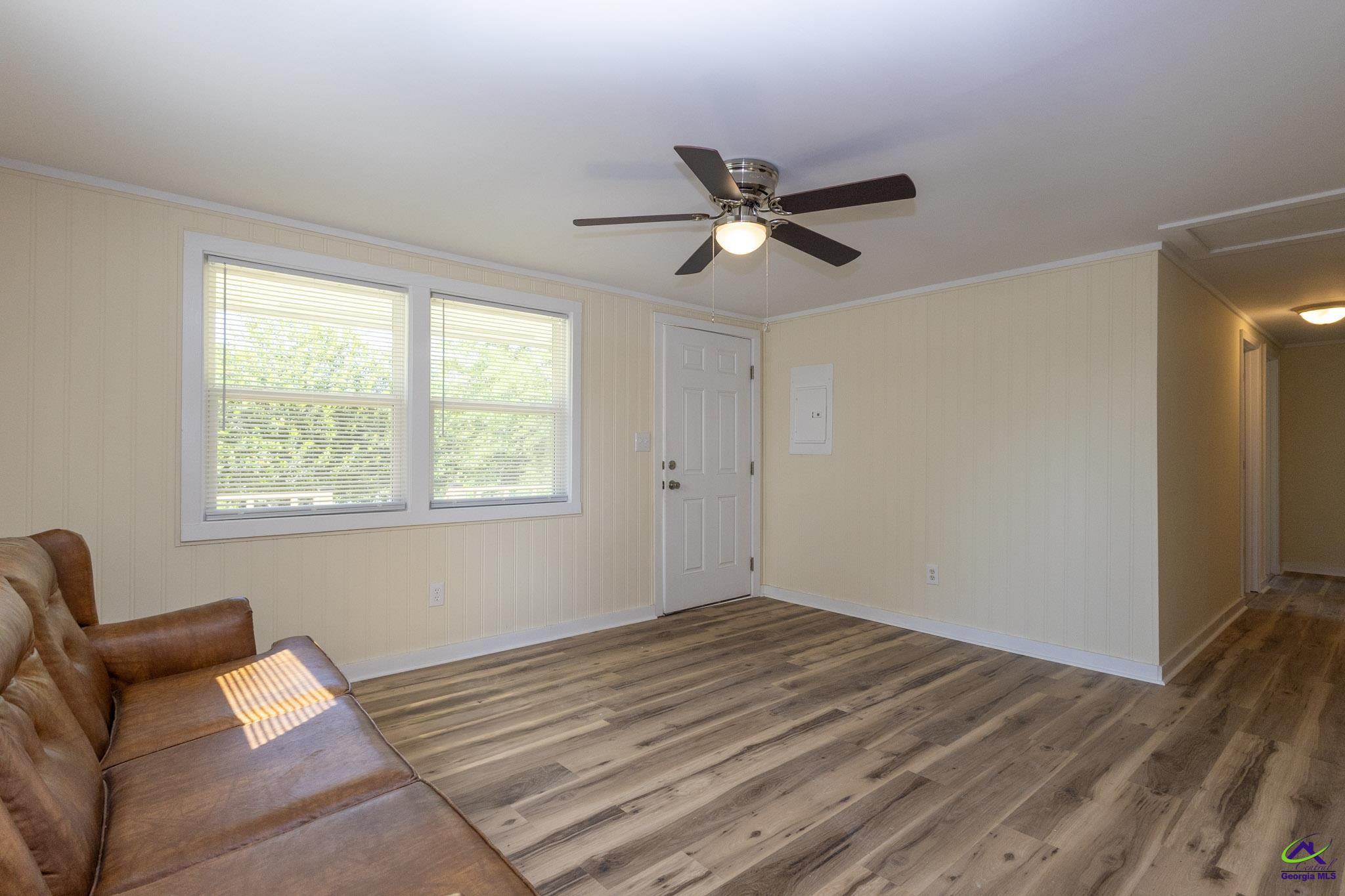 156 Churchwell Road Cochran, GA 31014 - Photo 7 of 20 a room with a bed furniture and a window