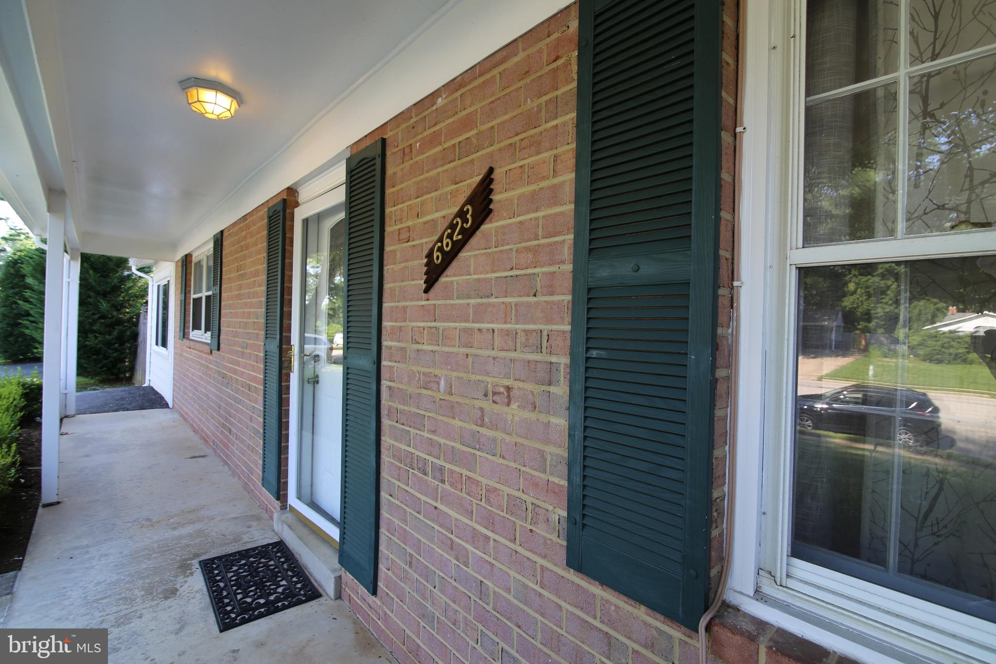 6623 Huntsman Boulevard Springfield, VA 22152 - Photo 4 of 32 Covered Front Porch