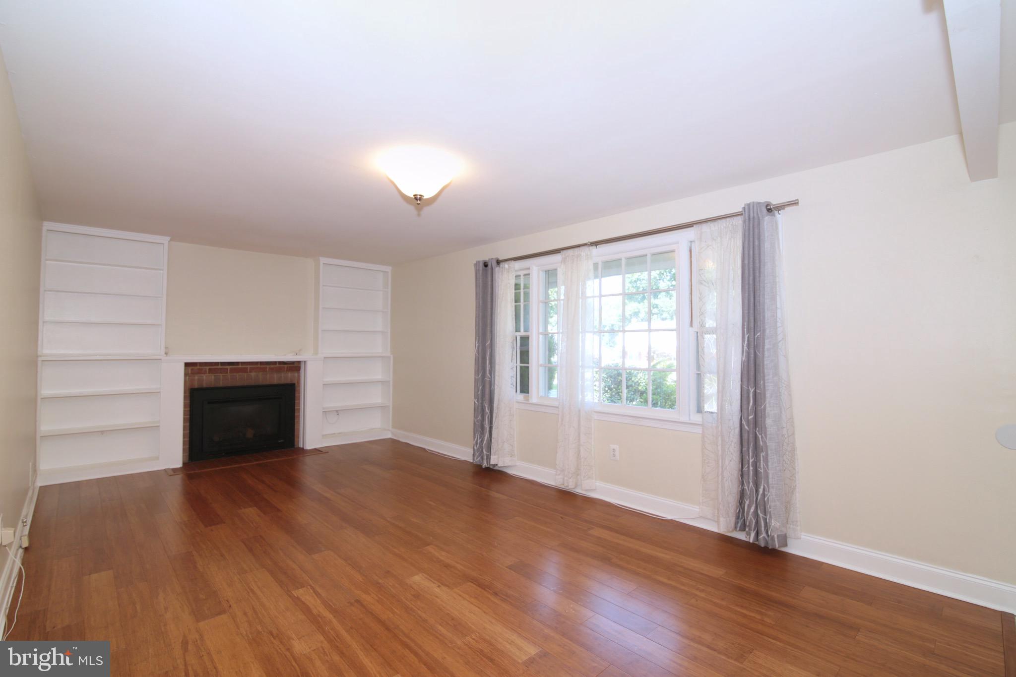 6623 Huntsman Boulevard Springfield, VA 22152 - Photo 7 of 32 Living Room with Gas Fireplace