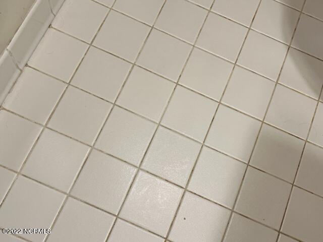 1985 Quail Ridge Road, Unit L Greenville, NC 27858 - Photo 24 of 43 Guest Bath Tile Floor