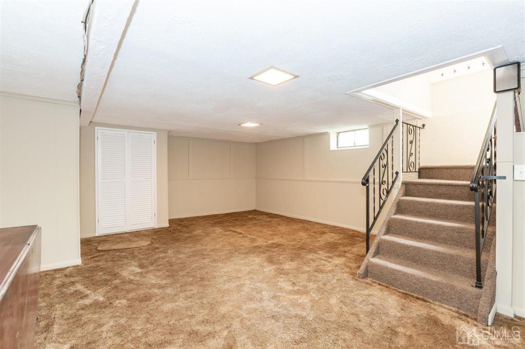642 Front Street Dunellen, NJ 08812 - Photo 13 of 24 a view of an empty room with stairs
