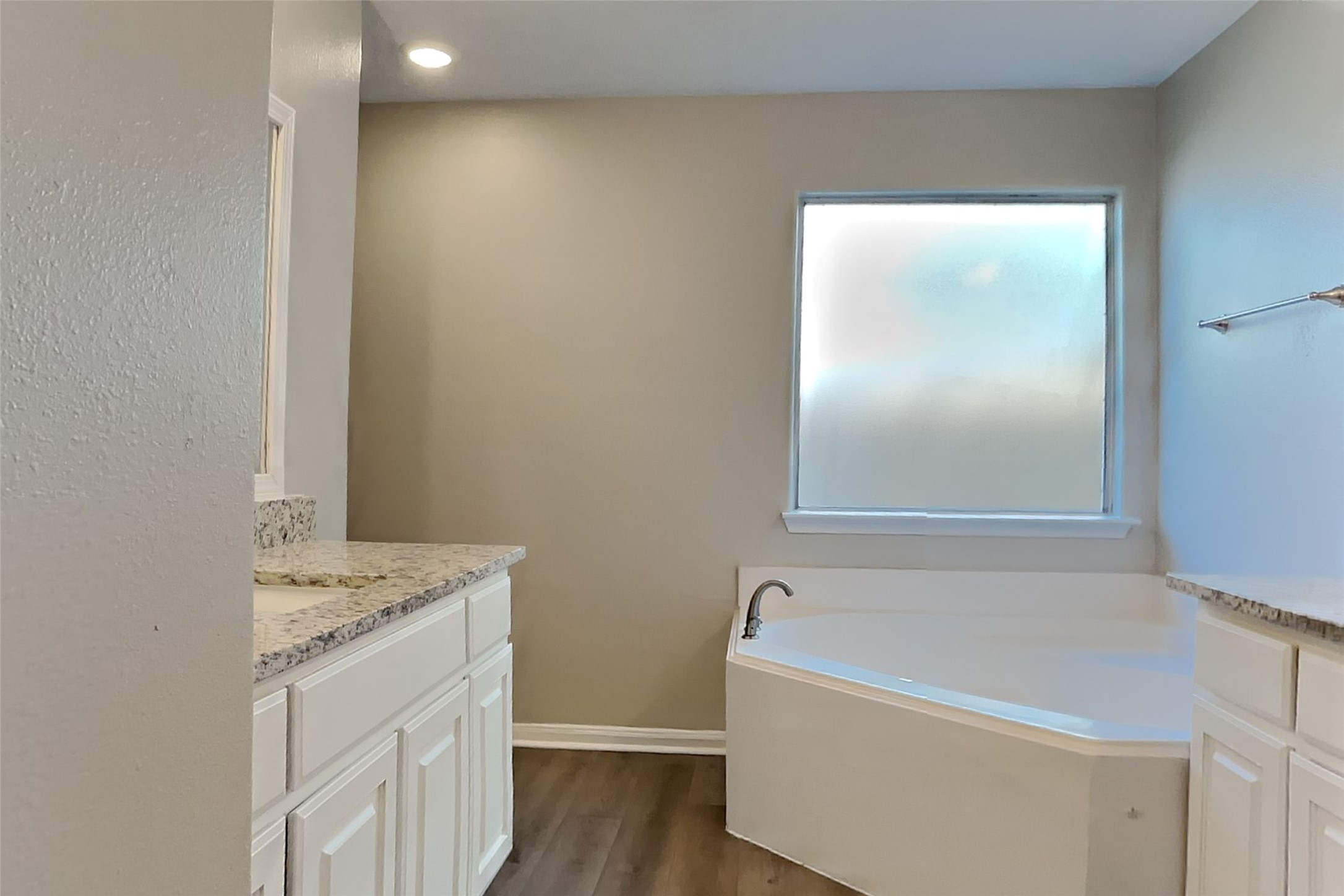 4938 Comal River Loop Spring, TX 77386 - Photo 9 of 14 a bathroom with a bathtub sink and mirror