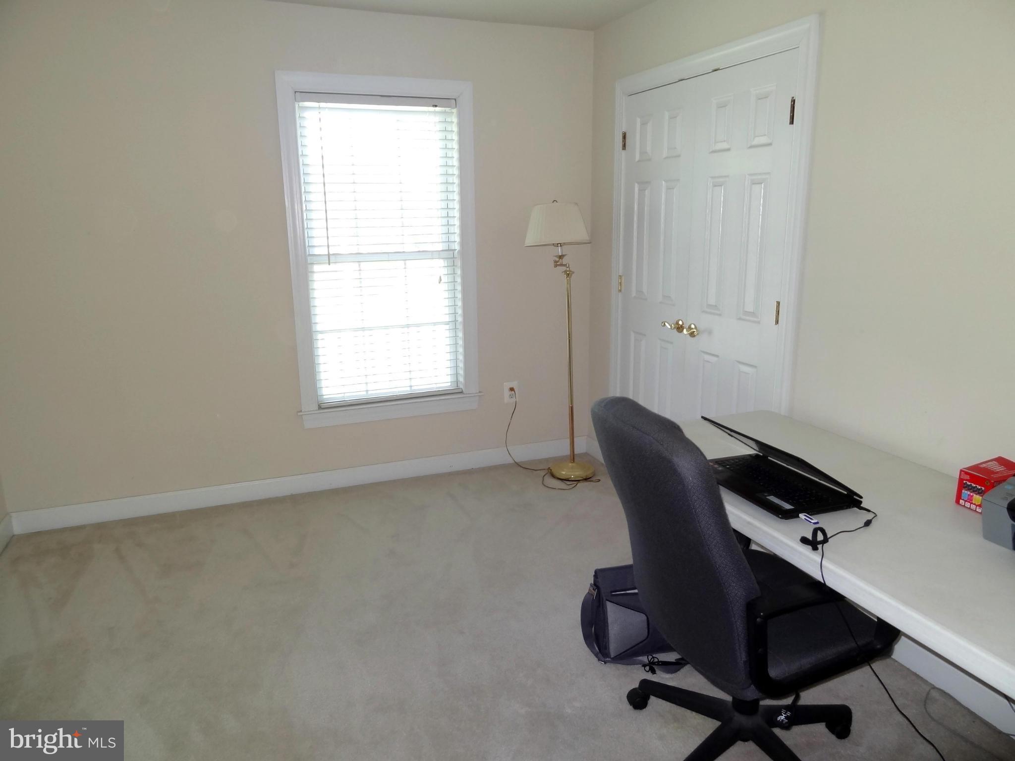 708 Hillmeade Road Edgewater, MD 21037 - Photo 18 of 23 a workspace with furniture and a window