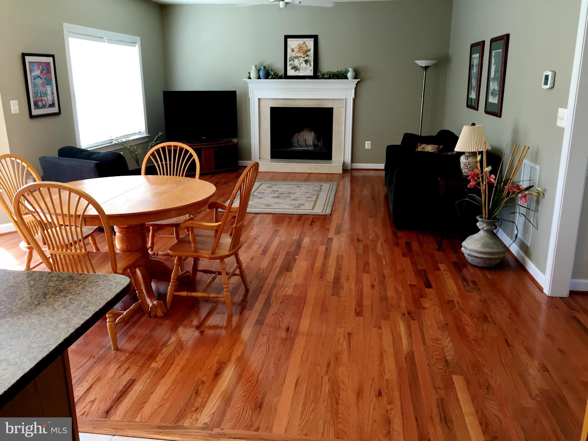 708 Hillmeade Road Edgewater, MD 21037 - Photo 6 of 23 a living room with furniture and a fireplace