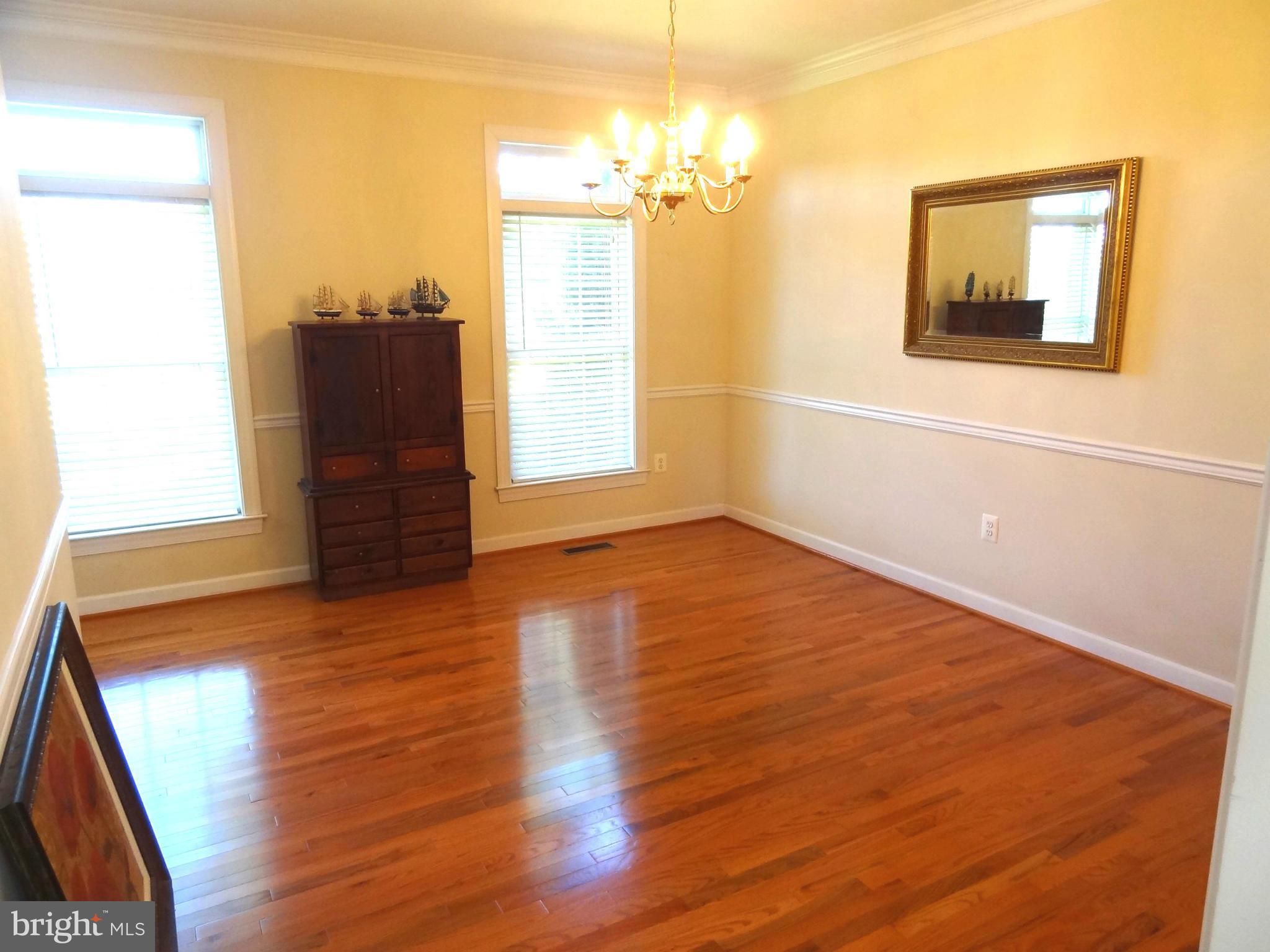 708 Hillmeade Road Edgewater, MD 21037 - Photo 7 of 23 a view of a livingroom with wooden floor