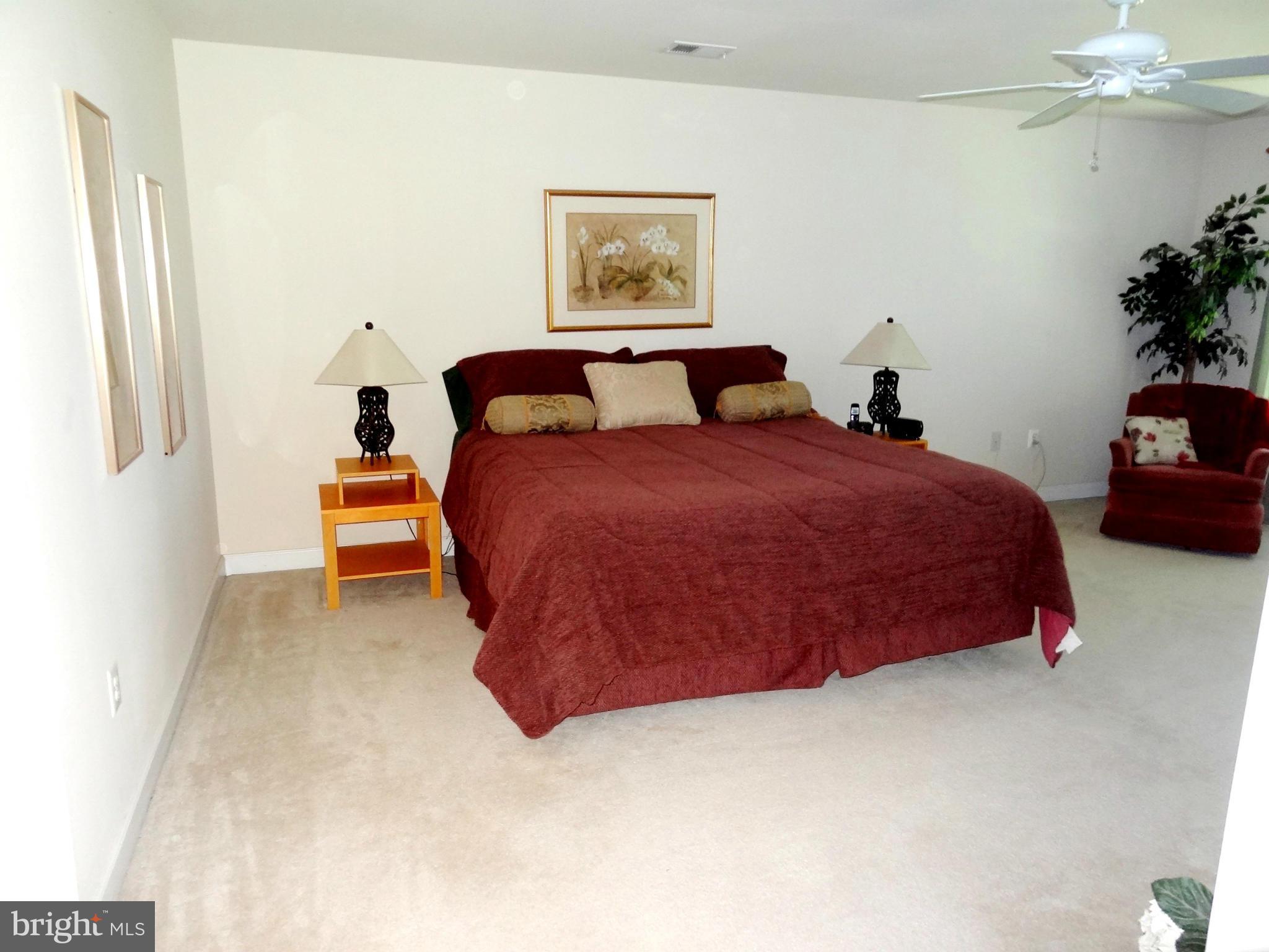 708 Hillmeade Road Edgewater, MD 21037 - Photo 10 of 23 a bedroom with bed and window