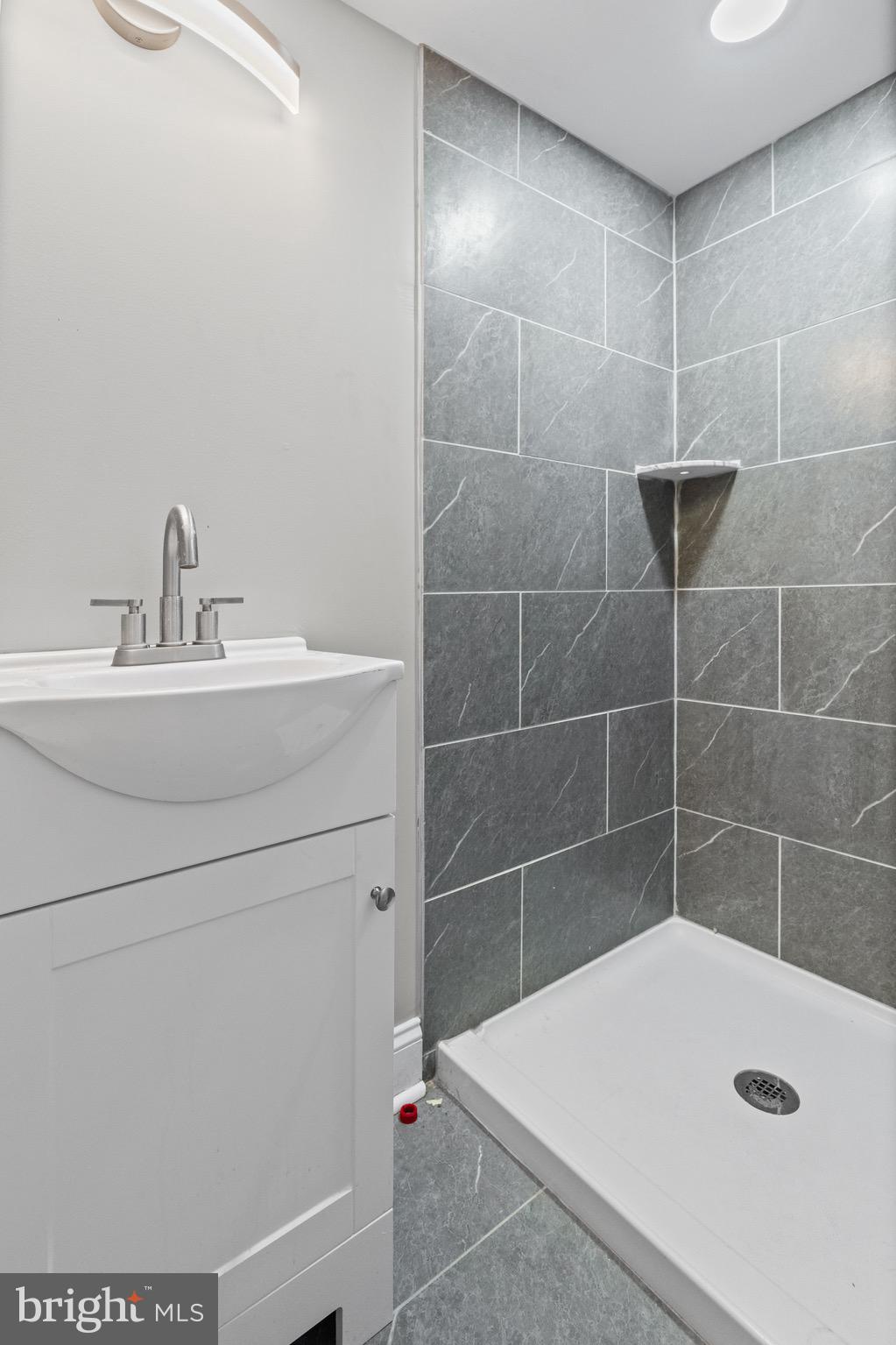 4139 Mountwood Road Baltimore, MD 21229 - Photo 19 of 53 a bathroom with a sink a toilet