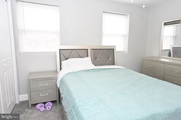 a view of a small space with wooden floor