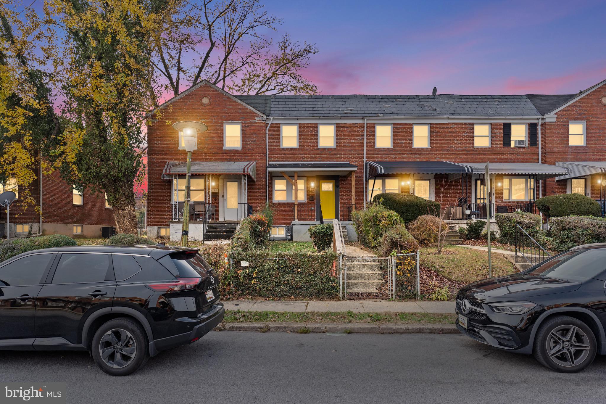 4139 Mountwood Road Baltimore, MD 21229 - Photo 48 of 53 a car parked in front of a house