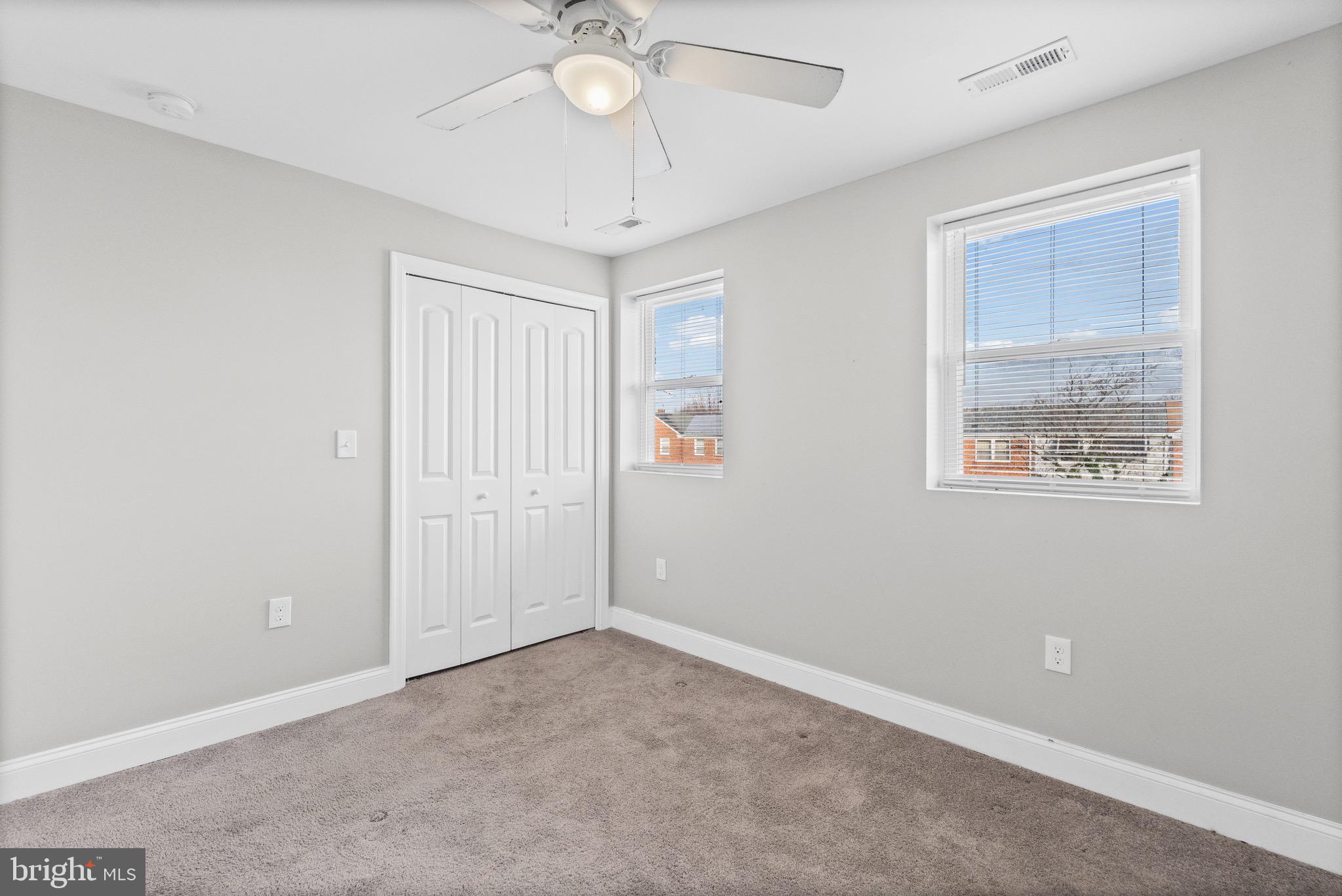 4139 Mountwood Road Baltimore, MD 21229 - Photo 9 of 53 a view of an empty room with a window