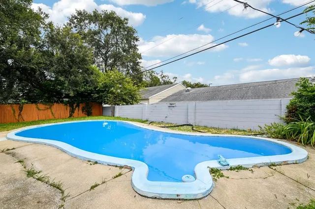 a view of outdoor space and swimming pool