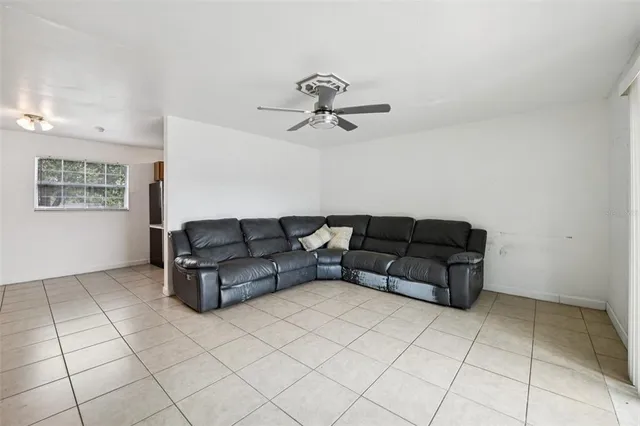 a living room with couches and furniture