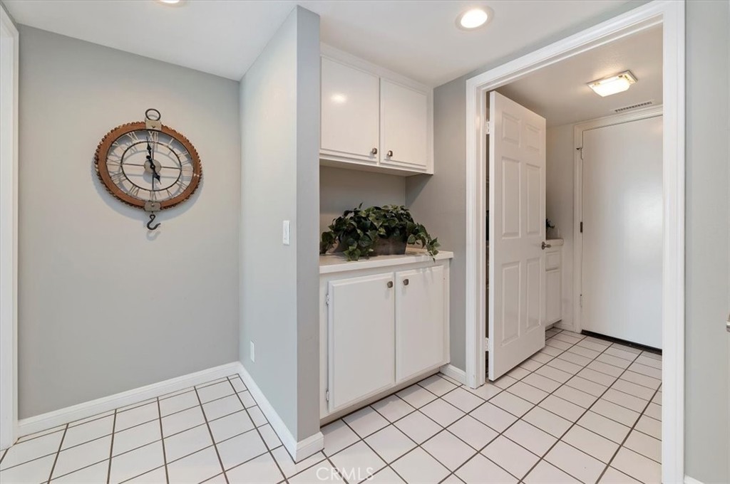 43966 Highlander Drive Temecula, CA 92592 - Photo 14 of 33 a view of a storage and utility room with cabinet