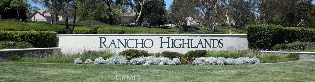 43966 Highlander Drive Temecula, CA 92592 - Photo 24 of 33 a sign that is sitting in front of a house with a yard