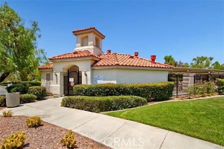 43966 Highlander Drive Temecula, CA 92592 - Photo 25 of 33 a front view of a house with a yard