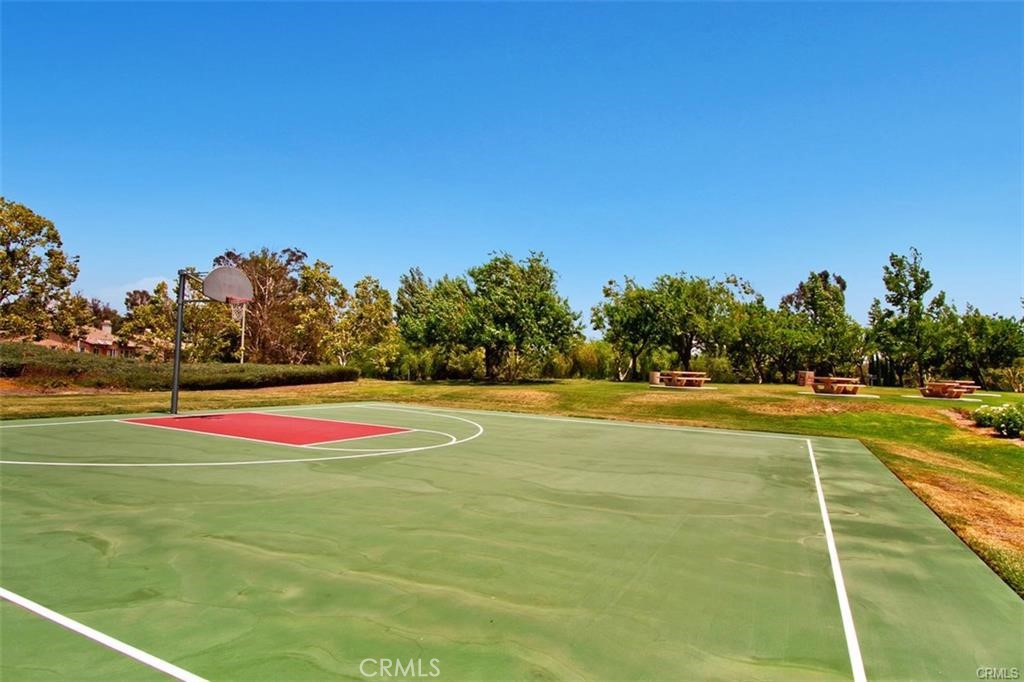 43966 Highlander Drive Temecula, CA 92592 - Photo 26 of 33 a view of swimming pool with outdoor seating and trees in the background