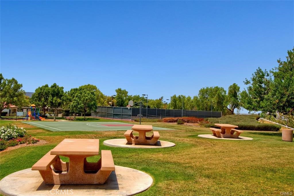 43966 Highlander Drive Temecula, CA 92592 - Photo 27 of 33 a view of a lake with lawn chairs