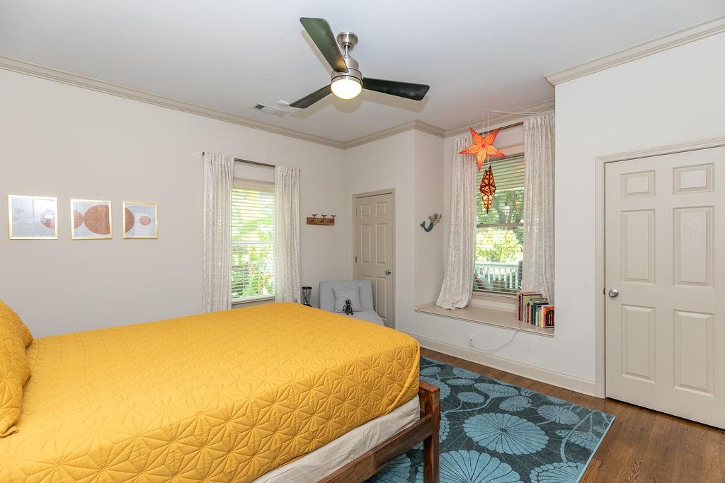 1084 Sanders Avenue Southeast, Unit A Atlanta, GA 30316 - Photo 23 of 44 a bedroom with a bed and wooden floor