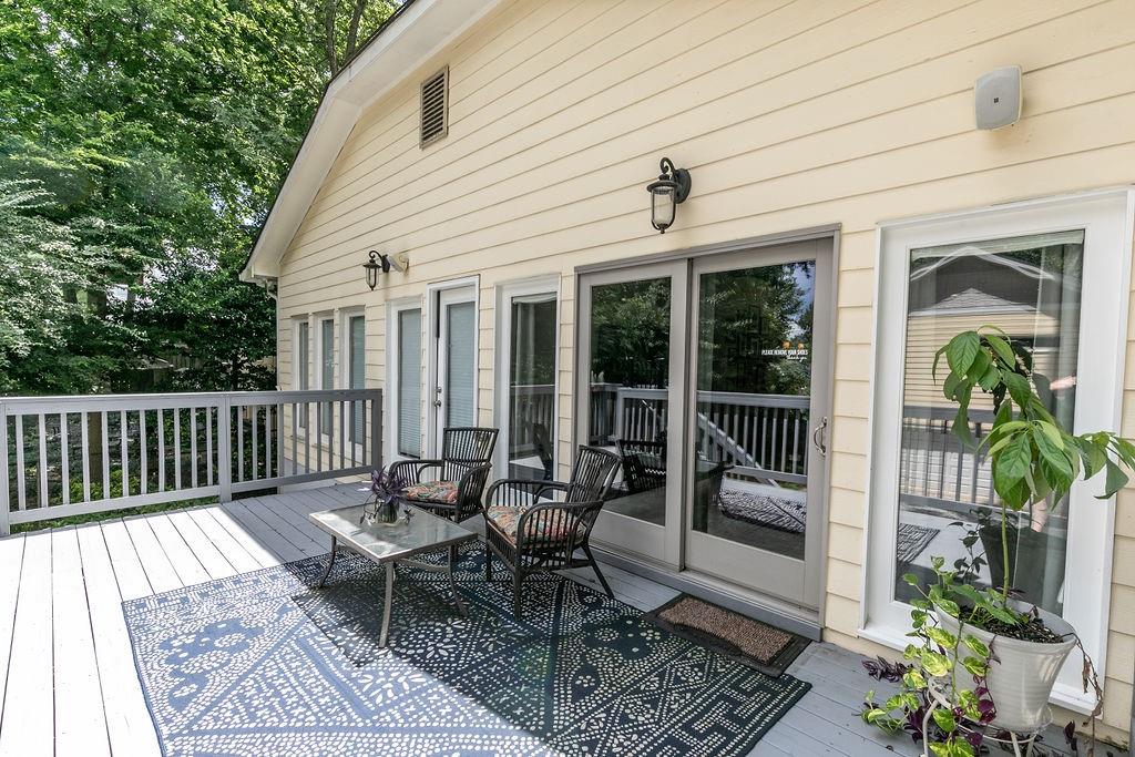 1084 Sanders Avenue Southeast, Unit A Atlanta, GA 30316 - Photo 42 of 44 a view of a patio with a table and chairs