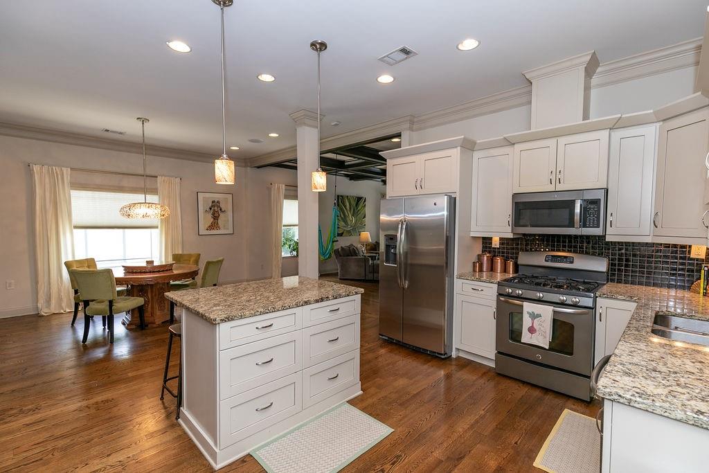 1084 Sanders Avenue Southeast, Unit A Atlanta, GA 30316 - Photo 9 of 44 a kitchen with stainless steel appliances granite countertop a stove refrigerator and a sink