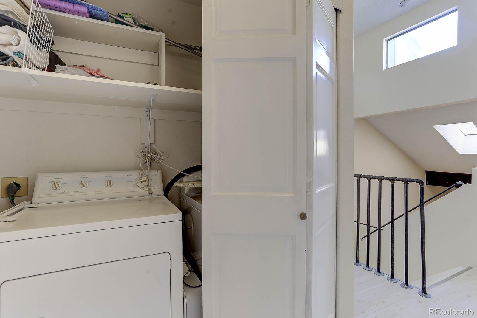 8794 Allison Drive, Unit B Arvada, CO 80005 - Photo 18 of 33 a utility room with dryer and washer