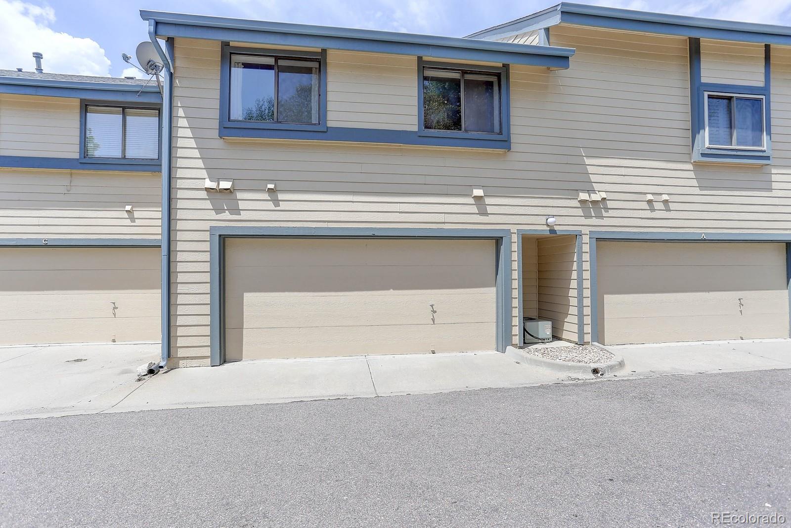 8794 Allison Drive, Unit B Arvada, CO 80005 - Photo 30 of 33 a view of a house with a outdoor space
