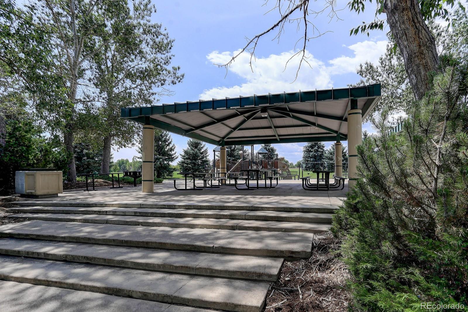 8794 Allison Drive, Unit B Arvada, CO 80005 - Photo 32 of 33 a view of a backyard of a house