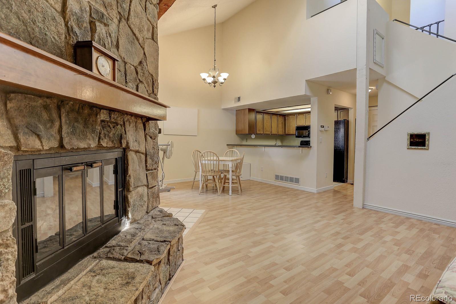8794 Allison Drive, Unit B Arvada, CO 80005 - Photo 4 of 33 a view of a kitchen with a sink
