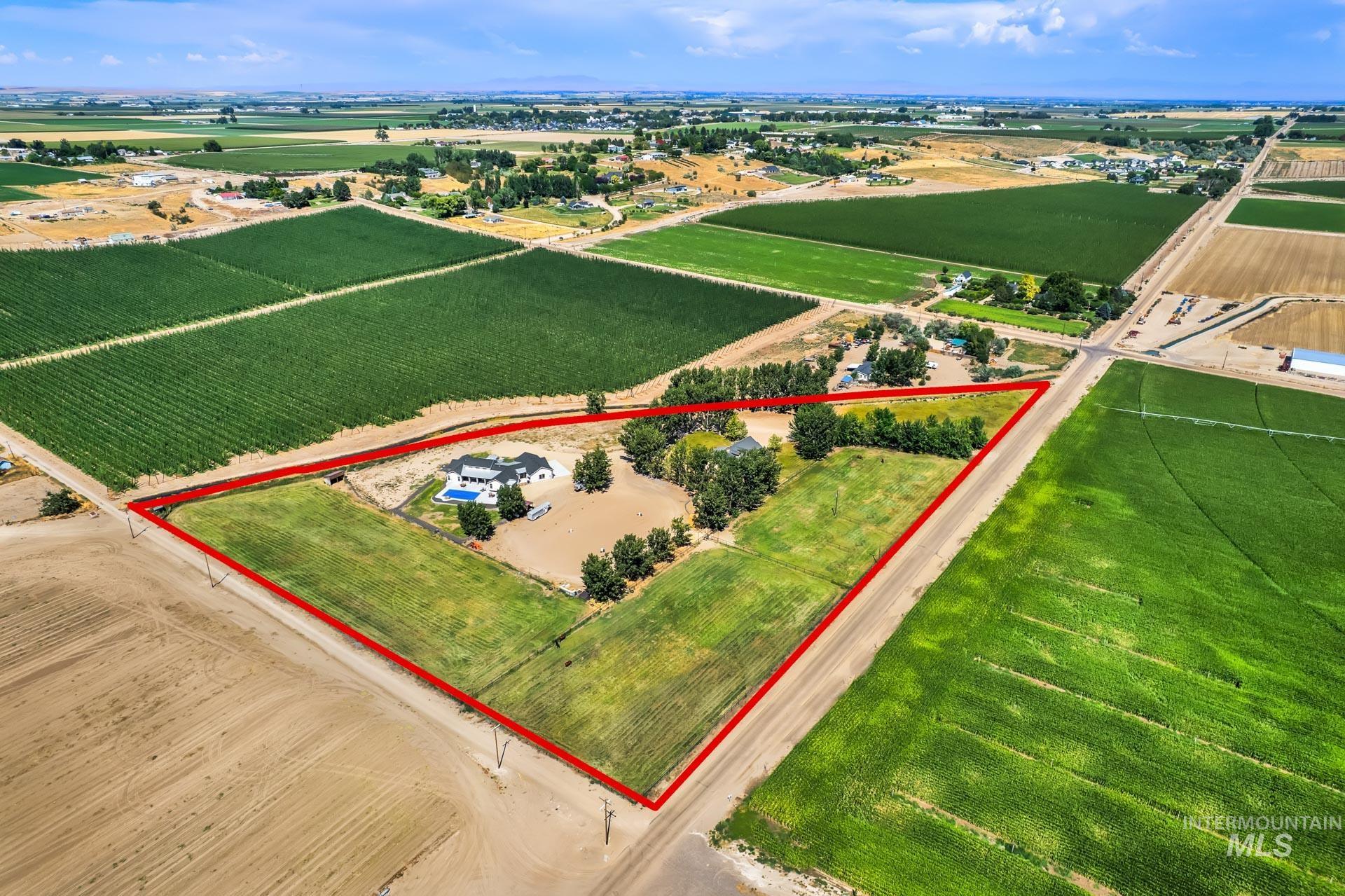 27114 Lower Pleasant Ridge Road Wilder, ID 83676 - Photo 45 of 50 Overview of rural landscape with large plots for crops and property boundaries highlighted