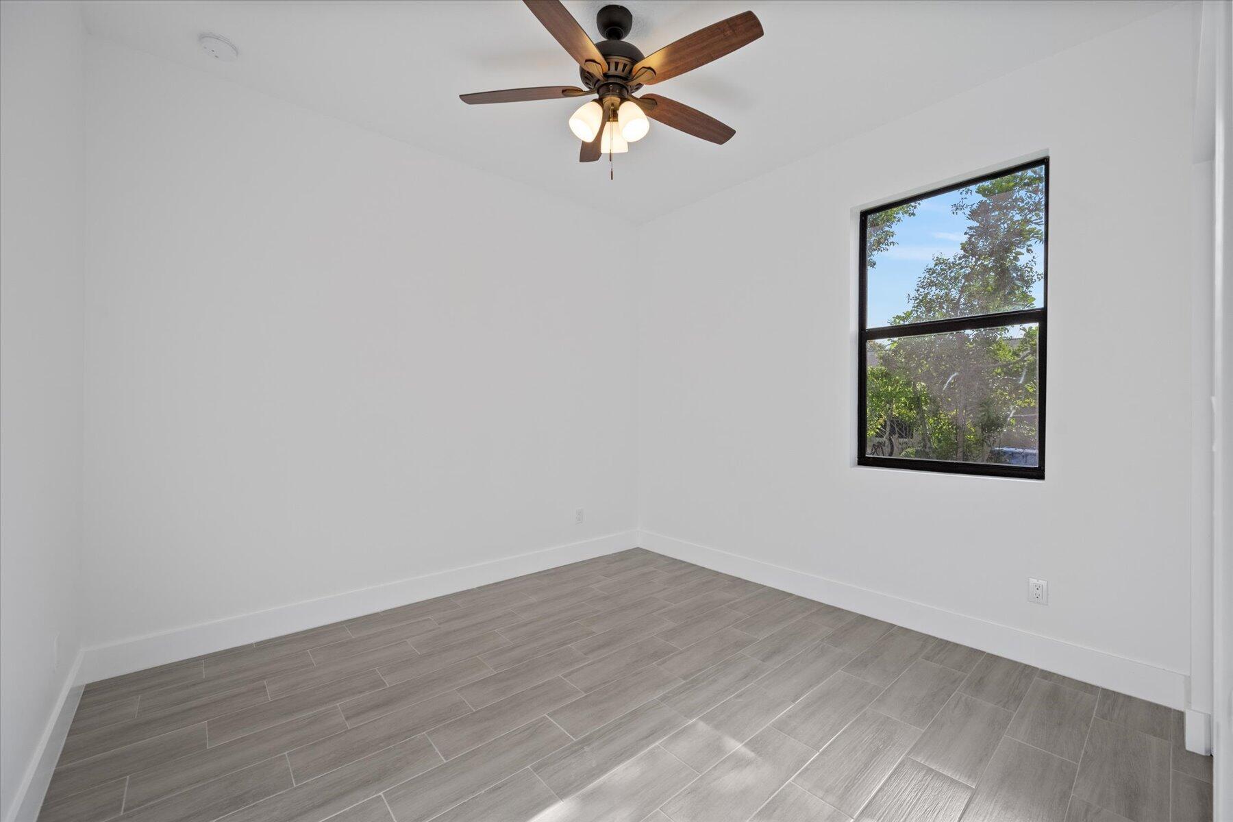 1491 West 30th Street Riviera Beach, FL 33404 - Photo 11 of 15 a view of a window in a room