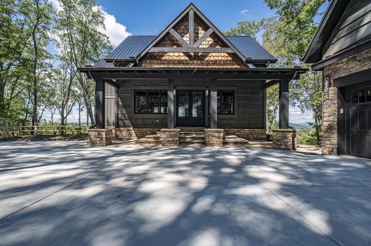 a view of a house with entrance gate