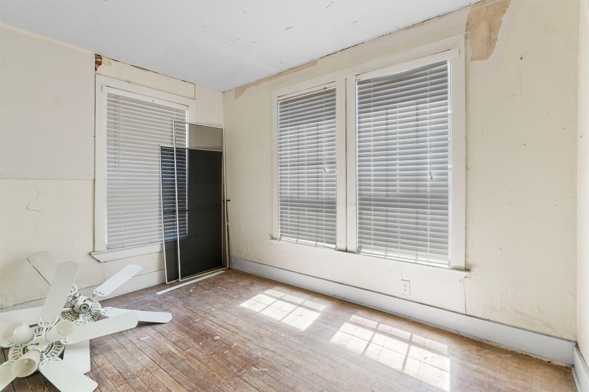 6311 Del Monte Road Austin, TX 78741 - Photo 14 of 24 a view of a livingroom with a dinning area and balcony