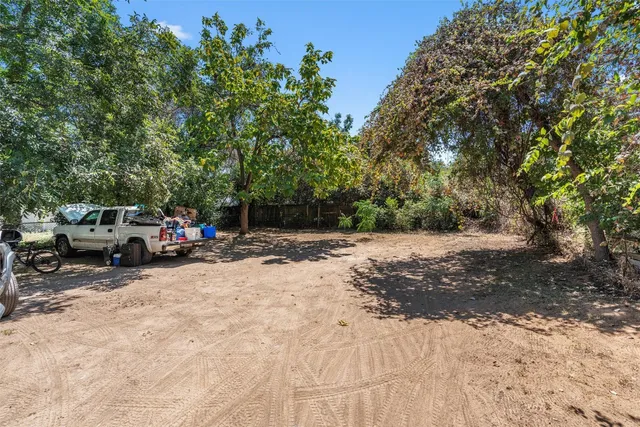 a view of car parked on the side of the road